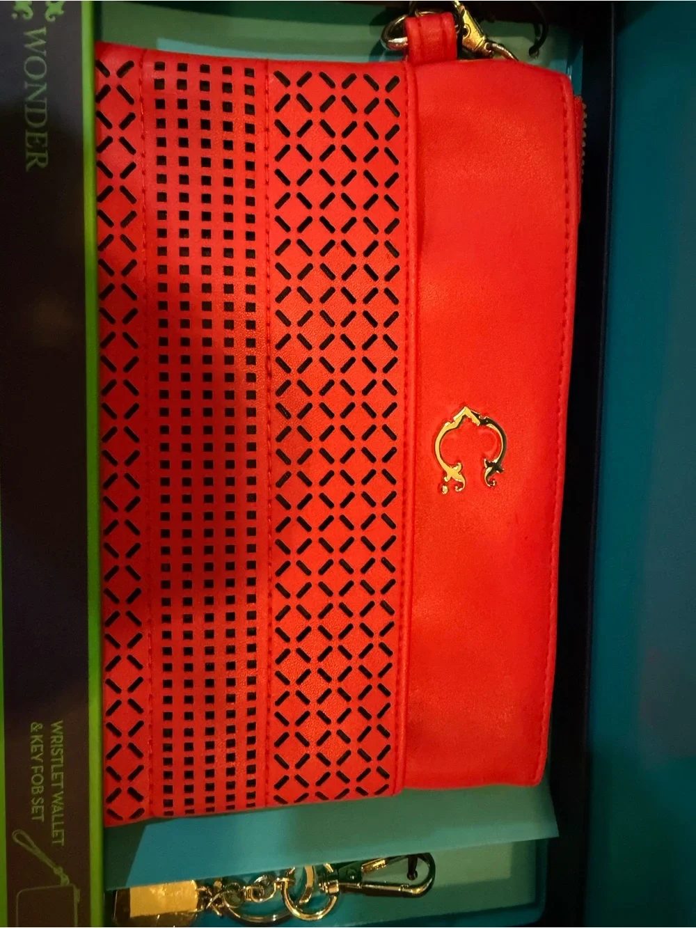 Red-Orange Laser-Cut Wristlet Clutch by Wonder